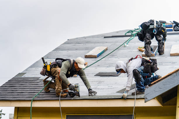 Professional Roofing technician working in Winchester, CA